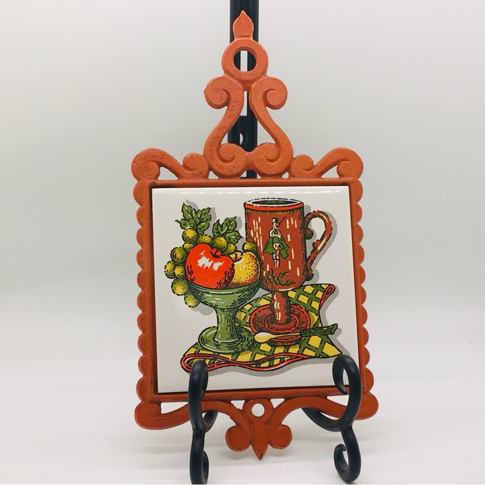MCM Orange Cast Iron and Tile Kitchen Trivet with fruit and goblet design